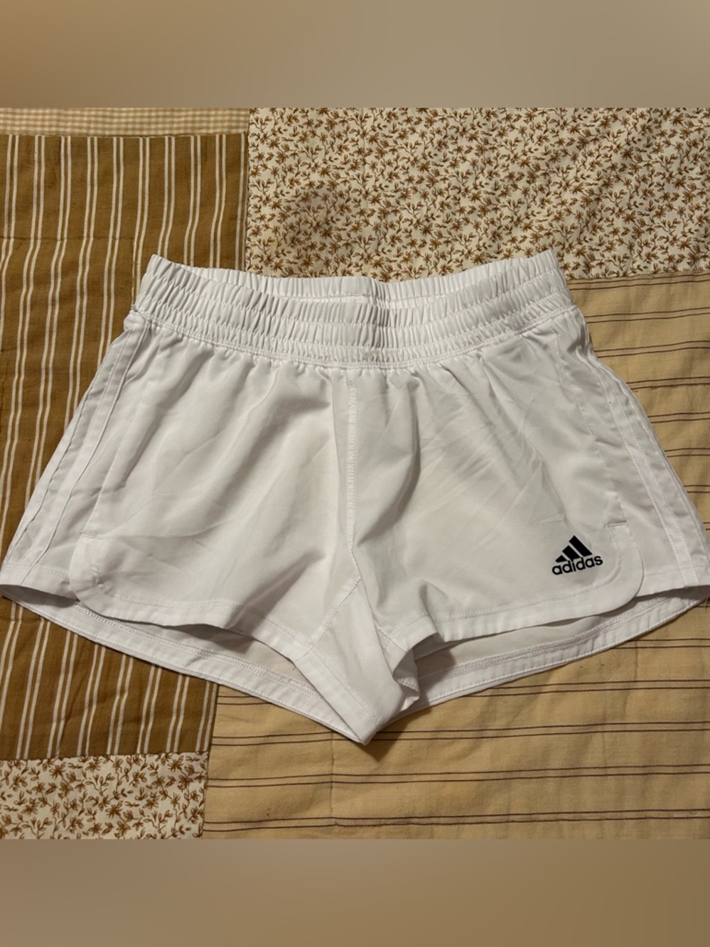 White adidas xs pacer sporty athletic shorts primegreen